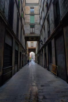 Gothic quarter in the morning. Empty alleyways in Barcelona, Spain