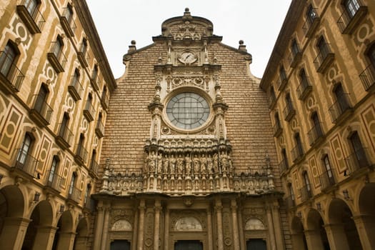 Facade of Santa Maria de Montserrat monastery. Catalonia, Spain