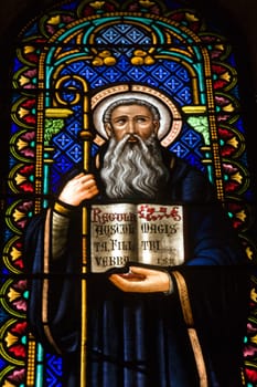 Monk portrait on stained glass window, church dedicated to our lady at Monserrat in Catalonia, Spain