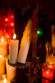 Red and green candles in the Monserrat Abby, Catalonia, Spain