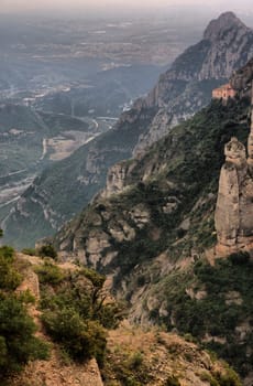 Montserrat mountain and the Cavall Bernat, the largest and best known of the Montserrat massif monoliths. Catalonia, Spain