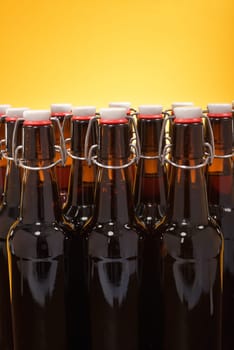 Close-up of many beer bottles with ironing closure