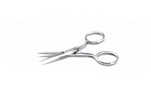 Medical scissors equipment on white background, stock photo