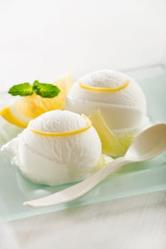 Fresh fruit sorbet ice cream in a white bowl.