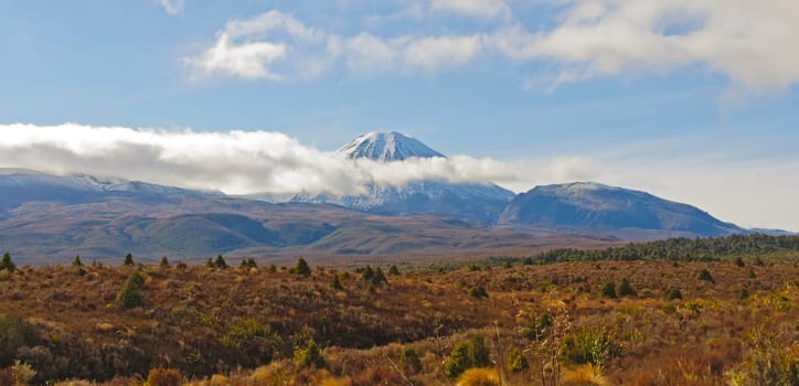 Mount Ngauruhoe through the clouds in New Zealand