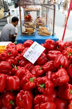 Fresh organic red bell pepper background, photo taken at local farmers market, in New York City