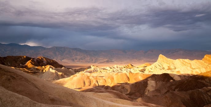 The cloud cover makes it for me at sunrise in Death Valley