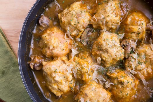 Fresh Bavarian bread dumplings with mushroom gravy sauce.
