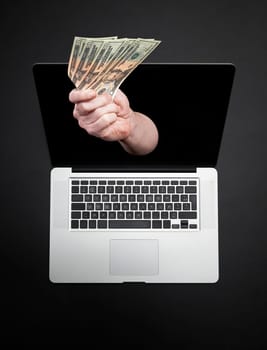 Getting money from laptop monitor screen - Online Transaction, Online Banking theme.