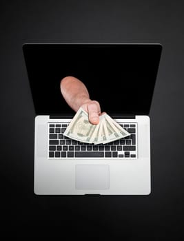 Getting money from laptop monitor screen - Online Transaction, Online Banking theme.