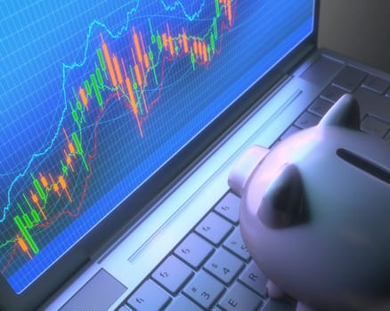 Piggy bank on laptop keyboard looking at the chart of the stock market.