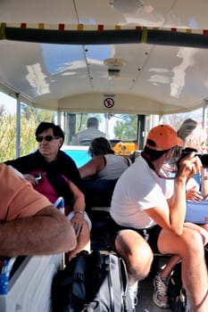 tourists in the tourist train to visit the salt business of Aigues-Mortes and to tour the mine salt site.