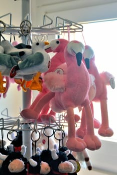 Selling items the gift shop saline Aigues-Mortes for tourists who wish to purchase plush pink flamingos.