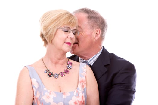 retired couple dressed up on white isolated background