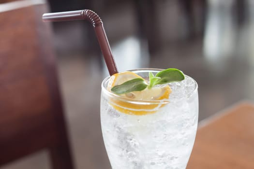 Glass of iced honey lemon soda, stock photo