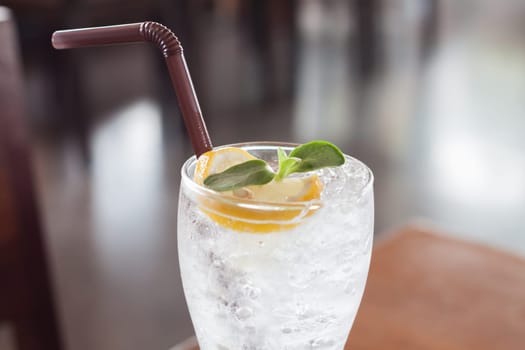Glass of iced honey lemon soda, stock photo