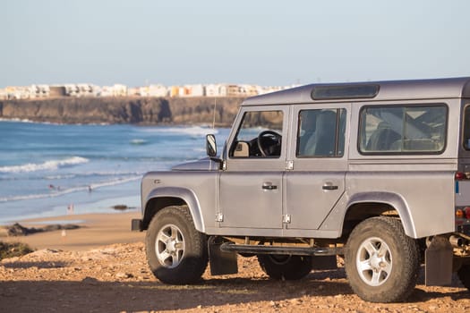 Jeep on Cotillo surfers beach on Fuerteventura, Canary Islands, Spain.