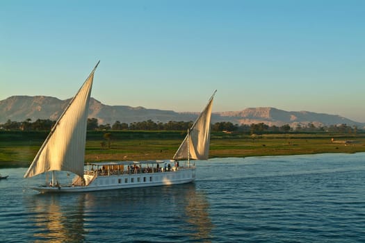 Egypt, Nile Valley, boat cruising on the Nile between Luxor and Aswan.