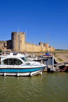 The marina of Aigues-Mortes in the background with the city walls.