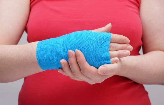 Woman's Hand and Bandage