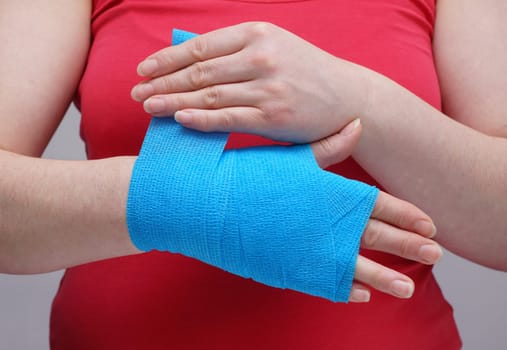 Woman's Hand and Bandage