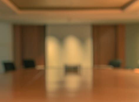 Blur image of empty boardroom with window cityscape background. Business concept