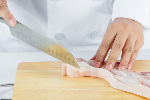chef sliced streaky pork on cutting boards