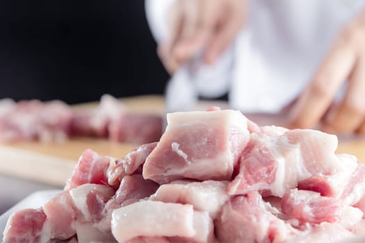 chef sliced streaky pork on cutting boards