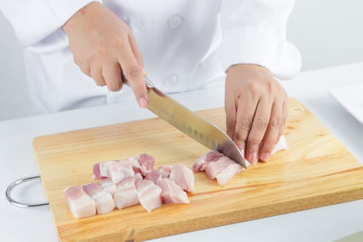 chef sliced streaky pork on cutting boards