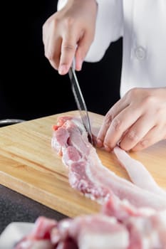 chef sliced streaky pork on cutting boards