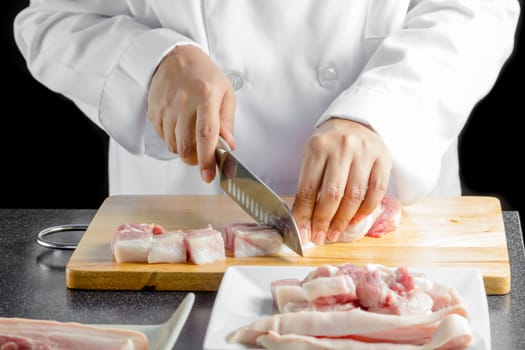 chef sliced streaky pork on cutting boards