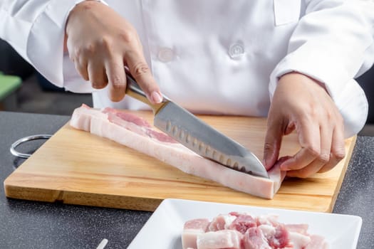 chef sliced streaky pork on cutting boards