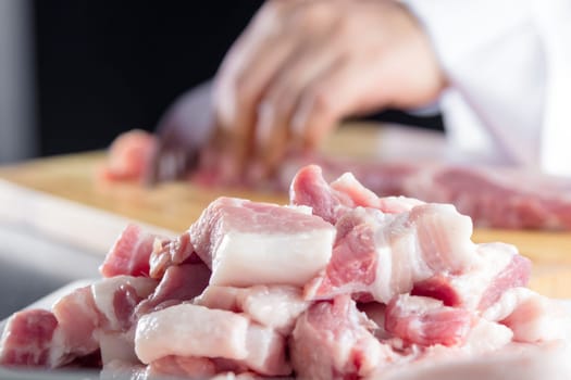 chef sliced streaky pork on cutting boards
