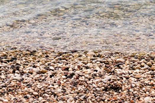 sea pebbles at the beach. Filmed close-ups.