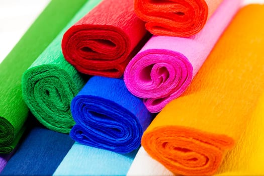 a few rolls of crepe paper in different colors. Close-up.
