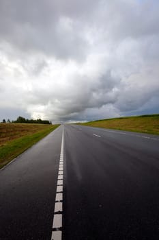 the highway in storm weather. Belarus. thunderstorm