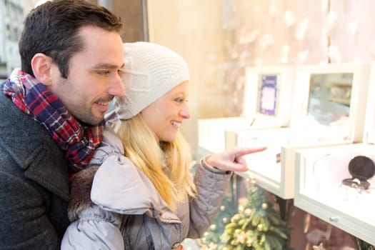View of an Young attractive couple doing some window shopping