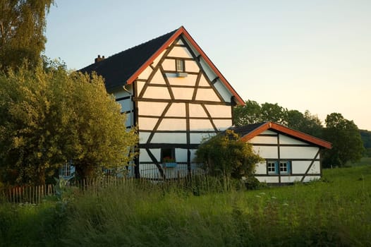 Beautiful sunlit old house in Limburg, Holland