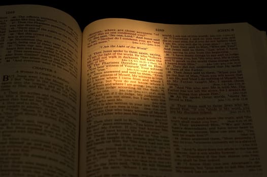 Closeup of the Bible. On dark background.