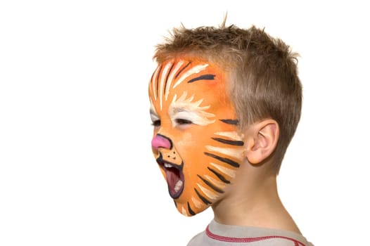 Little 5 year old yelling and screaming. Face-painted as a lion.