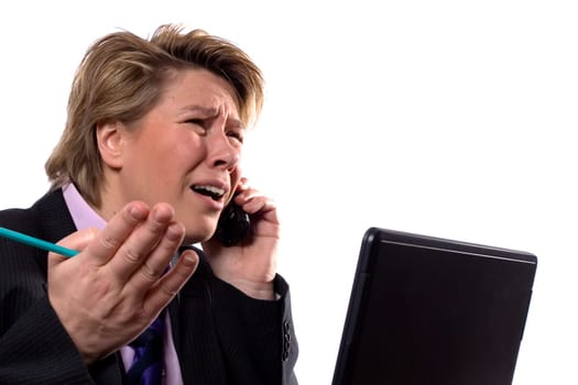A businesswoman arguing with her boss over the phone.
