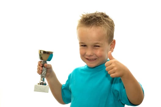 Boy has won his first cup final, he is very proud.