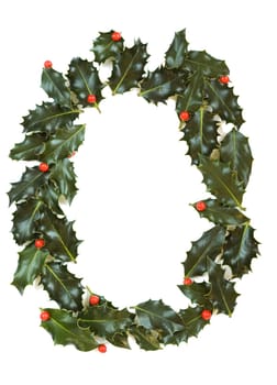 Holly Leaves with berry's in the form of the digit zero. Isolated on white.