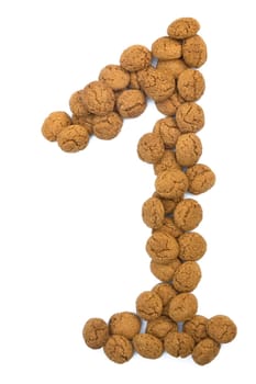 Little ginger nuts in the form of the digit one. These little ginger nuts are used in Holland for the "Sinterklaas"" party, which is at Dec 5 every year. Sinterklaas is a sort of Santa Claus. In Holland these ginger nuts are called ""pepernoot"". Isolated on white."