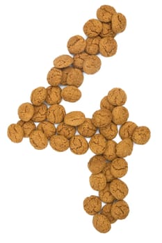Little ginger nuts in the form of the digit four. These little ginger nuts are used in Holland for the "Sinterklaas"" party, which is at Dec 5 every year. Sinterklaas is a sort of Santa Claus. In Holland these ginger nuts are called ""pepernoot"". Isolated on white."