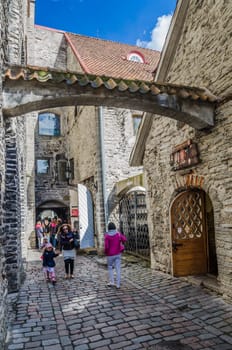 TALLINN, ESTONIA - MAY 31: People walk down the street in the Old Town Celebration Days On May 31, 2015 In Tallinn.