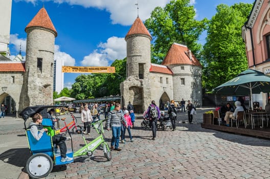 TALLINN, ESTONIA - MAY 31: People walk down the street in the Old Town Celebration Days On May 31, 2015 In Tallinn.
