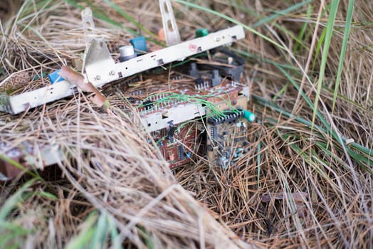 electronic waste on grass