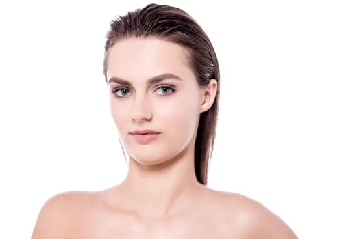 Elegant caucasian woman posing to camera over white