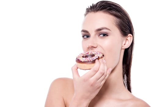 Young woman holding a sweet donut